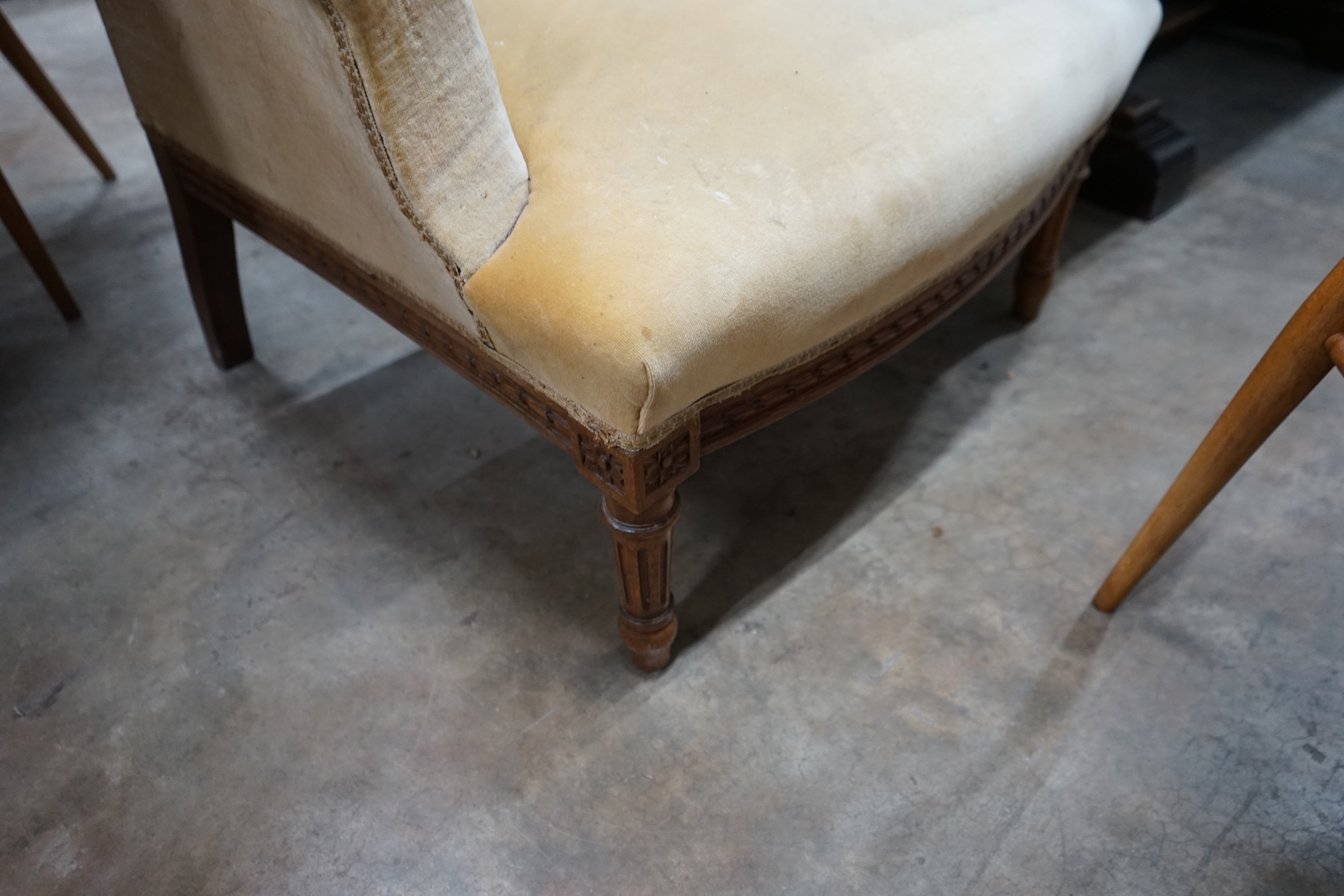 A late 19th century French carved beech upholstered armchair, width 80cm depth 70cm height 96cm